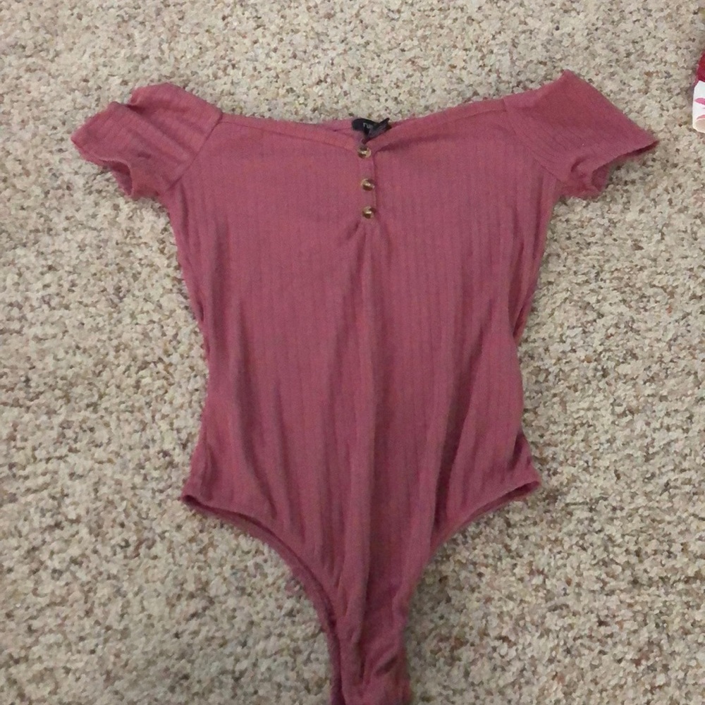 It’s a pink body suit